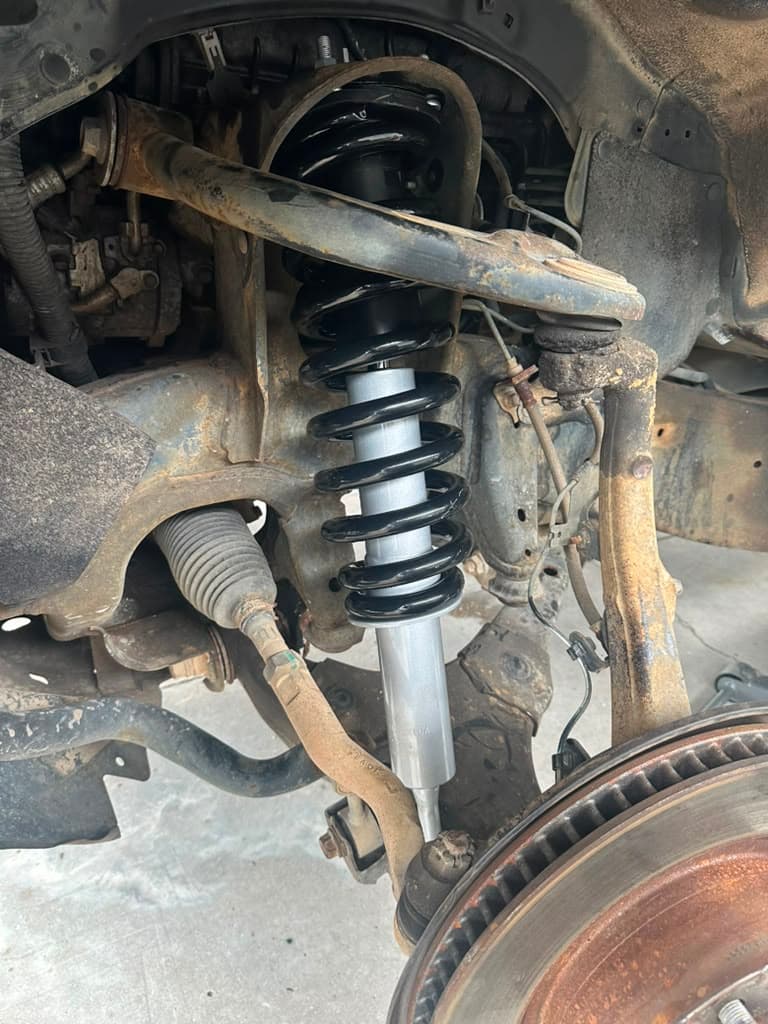 Front suspension and strut assembly repair