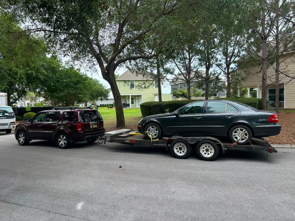 Vehicle being transported on OAZA's trailer